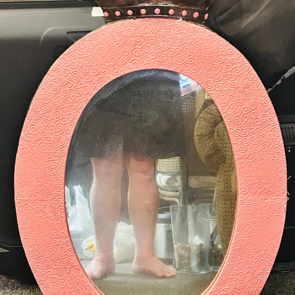 The frame is peach/points same . Crown is dark rhinestones under points.